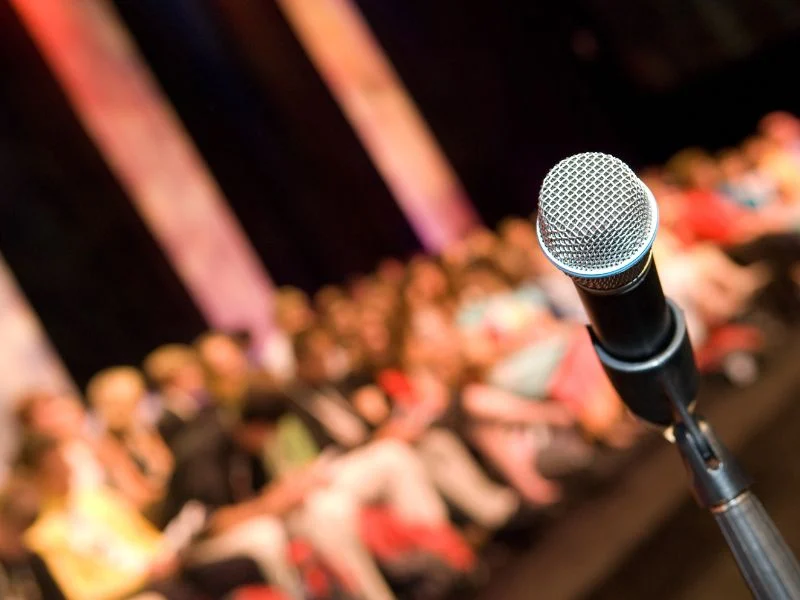 Microphone in front of an audience