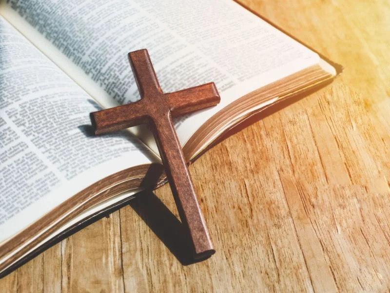 Cross on a Bible